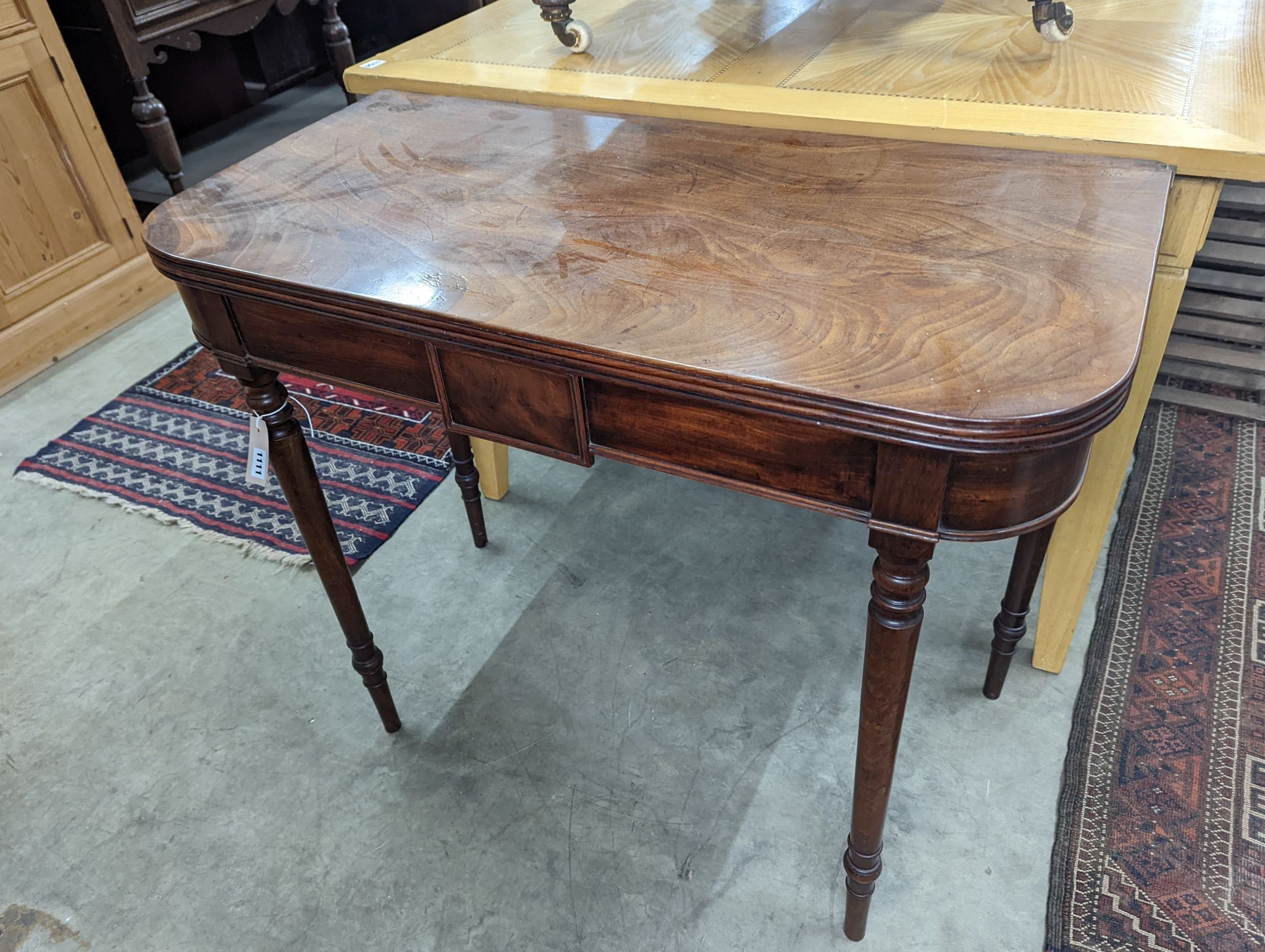 A Regency mahogany rectangular folding tea table, width 90cm, depth 45cm, height 74cm